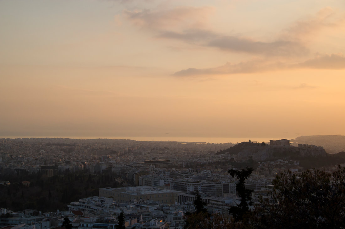 A view of the city of Athens during sunset